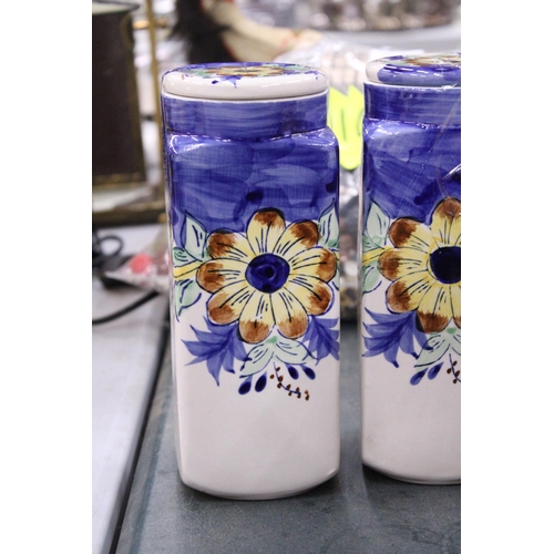 86 - FOUR CERAMIC HANDPAINTED STORAGE JARS