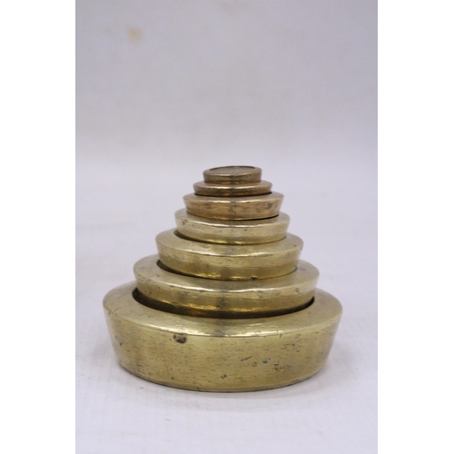 88 - A VINTAGE SOLID BRASS WEIGHT SET