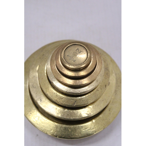 88 - A VINTAGE SOLID BRASS WEIGHT SET