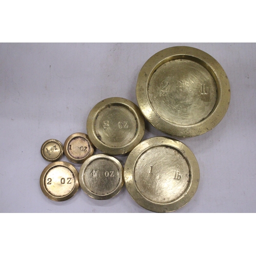 88 - A VINTAGE SOLID BRASS WEIGHT SET