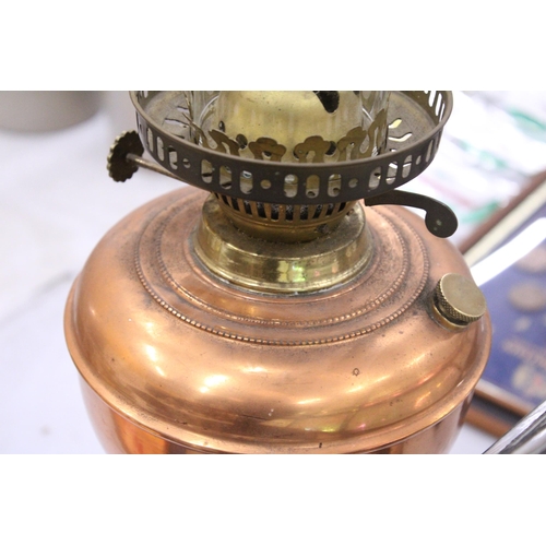 90 - A COPPER AND BRASS OIL LAMP