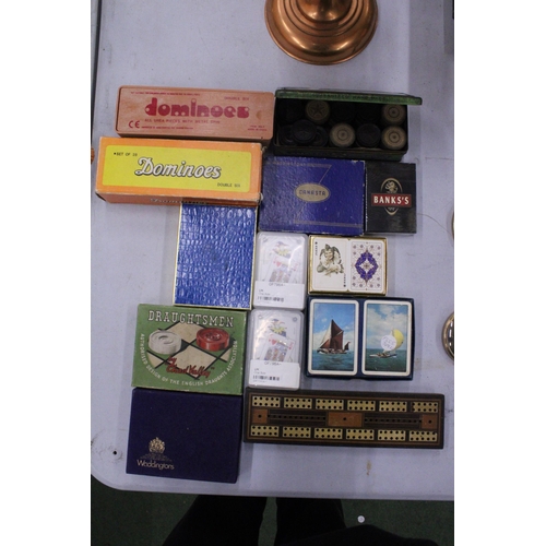 91 - A COLLECTION OF VINTAGE GAMES TO INCLUDE DRAUGHTS, CARDS, CRIBBAGE BOARD, CARDS, ETC.,