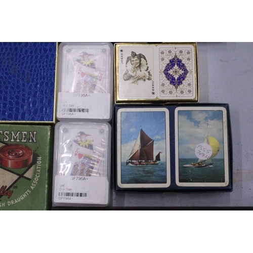 91 - A COLLECTION OF VINTAGE GAMES TO INCLUDE DRAUGHTS, CARDS, CRIBBAGE BOARD, CARDS, ETC.,