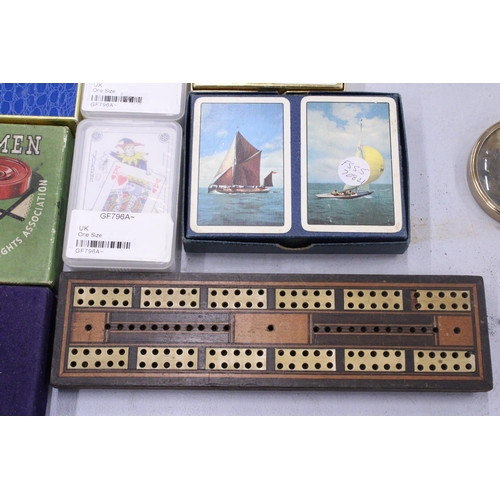 91 - A COLLECTION OF VINTAGE GAMES TO INCLUDE DRAUGHTS, CARDS, CRIBBAGE BOARD, CARDS, ETC.,