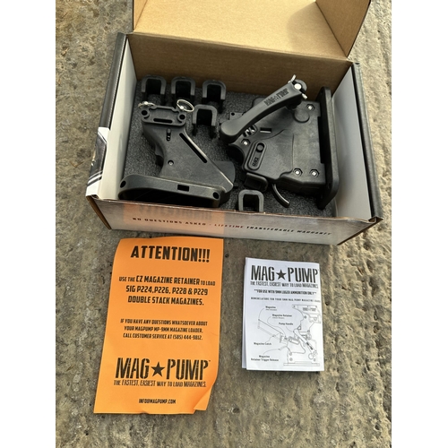 3911 - TWO BOXED MAG PUMPS AR-15