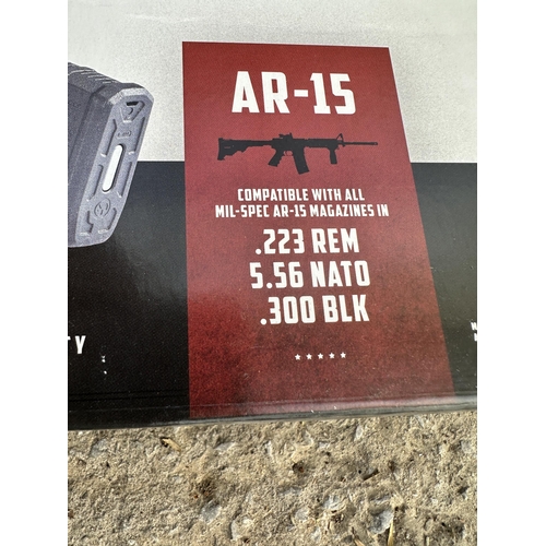 3912 - TWO BOXED MAG PUMPS AR-15