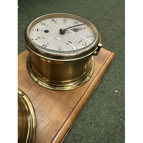 45A - A VINTAGE SCHATZ BRASS ROYAL MARINER SHIP CLOCK AND BAROMETER ON A WOODEN STAND