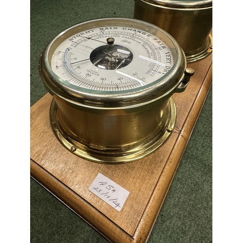 45A - A VINTAGE SCHATZ BRASS ROYAL MARINER SHIP CLOCK AND BAROMETER ON A WOODEN STAND