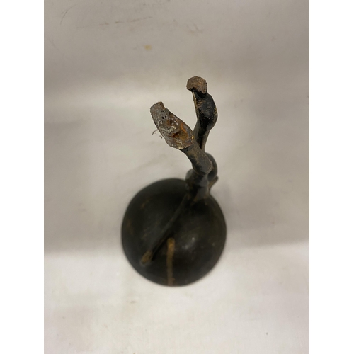 28 - A VINTAGE CAST IRON PAL-BELL DANCER SCULPTURE