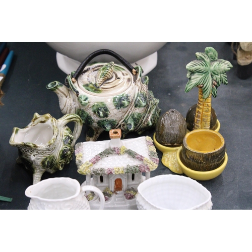 134 - A QUANTITY OF BELLEEK STYLE POTTERY, A SHELL STYLE TEAPOT AND JUG, CRUET SET WITH PALM TREE HOLDER, ... 