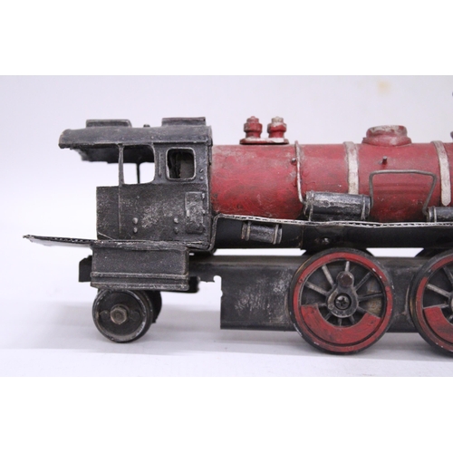 193 - A LARGE NORTH AMERICAN STELL AND TIN PLATE LOCO