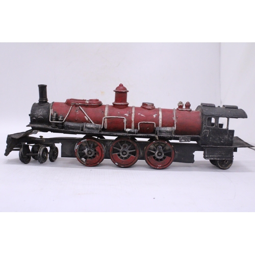 193 - A LARGE NORTH AMERICAN STELL AND TIN PLATE LOCO