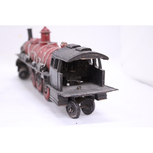 193 - A LARGE NORTH AMERICAN STELL AND TIN PLATE LOCO