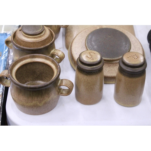 242 - A QUANTITY OF DENBY STONE DINNER WARE TO INCLUDE LIDDED SOUP POTS, A CRUET SET, ETC