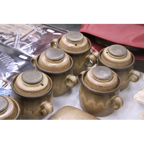 242 - A QUANTITY OF DENBY STONE DINNER WARE TO INCLUDE LIDDED SOUP POTS, A CRUET SET, ETC