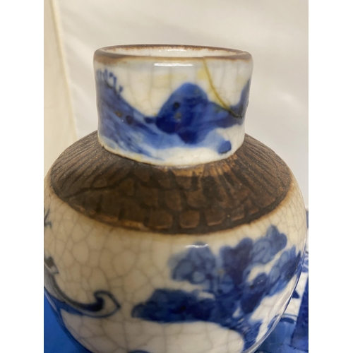 301 - A PAIR OF ANTIQUE CHINESE CRACKLE WARE VASES DECORATED WITH A BLUE PAINTED LANDSCAPE WITH A DARK BRO... 