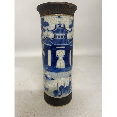 317 - A CHINESE BLUE AND WHITE CRACKLE GLAZE VASE WITH LANDSCAPE SCENE WITH SIGNATURE TO BASE - 20 CM (RIM... 