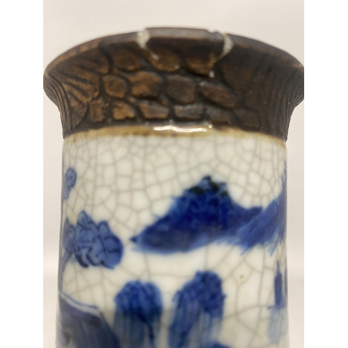 317 - A CHINESE BLUE AND WHITE CRACKLE GLAZE VASE WITH LANDSCAPE SCENE WITH SIGNATURE TO BASE - 20 CM (RIM... 