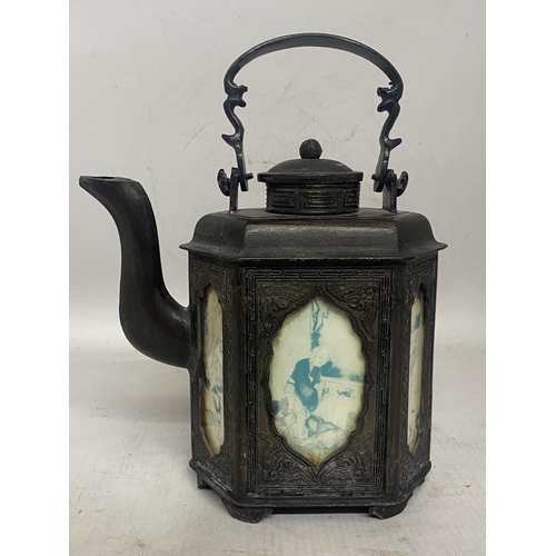 323 - AN ANTIQUE PEWTER CHINESE TEAPOT WITH HANDPAINTED GLASS PANELS