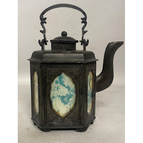 323 - AN ANTIQUE PEWTER CHINESE TEAPOT WITH HANDPAINTED GLASS PANELS