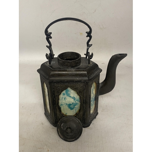 323 - AN ANTIQUE PEWTER CHINESE TEAPOT WITH HANDPAINTED GLASS PANELS