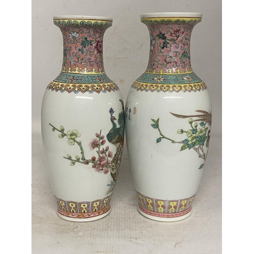 335 - A PAIR OF CHINESE JINGDEZHEN FAMILLE ROSE POTTERY VASES - 26 CM (H)