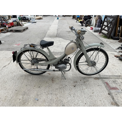 1557 - A VINTAGE NSU QUICKLY MOPED - BELIEVED IN WORKING ORDER BUT AS WITH ALL ITEMS IN THE AUCTION, NO WAR... 