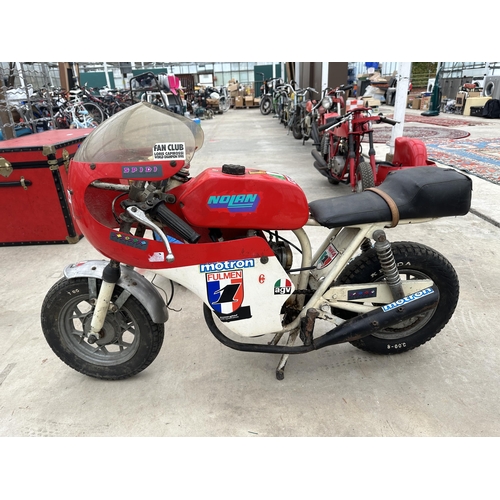 1561 - A VINTAGE MV AGUSTA MINI MOTORCYCLE, WHEEL HUB DIAMETER 22 CM, TWO EXHAUSTS