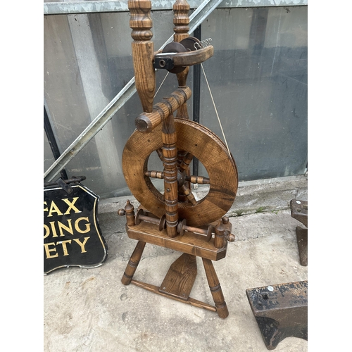 1504 - A VINTAGE WOODEN SPINNING WHEEL