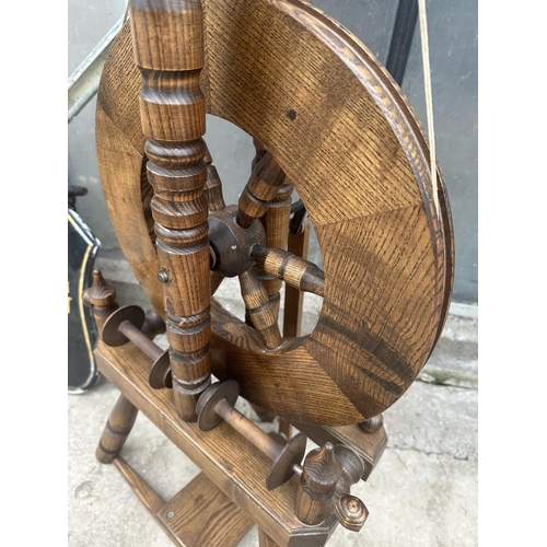 1504 - A VINTAGE WOODEN SPINNING WHEEL