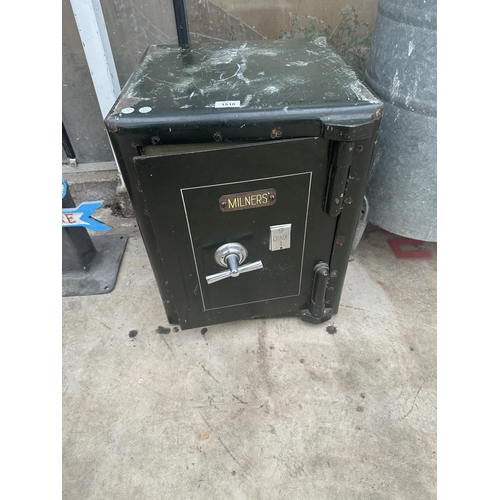 1510 - A HEAVY DUTY MILNERS SAFE COMPLETE WITH KEY