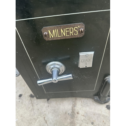 1510 - A HEAVY DUTY MILNERS SAFE COMPLETE WITH KEY