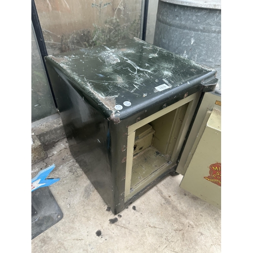 1510 - A HEAVY DUTY MILNERS SAFE COMPLETE WITH KEY