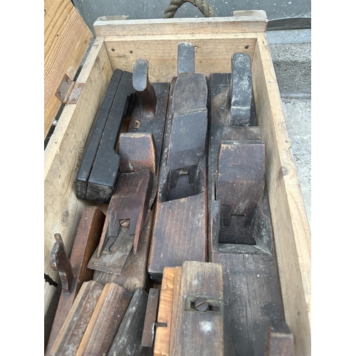 1512 - A LARGE WOODEN BOX CONTAINING A LARGE QUANTITY OF VINTAGE WOOD WORKING TOOLS TO INCLUDE DRILL BITS A... 