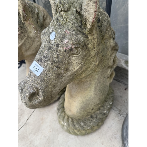 1514 - A PAIR OF CONCRETE HORSE HEAD GARDEN FIGURES