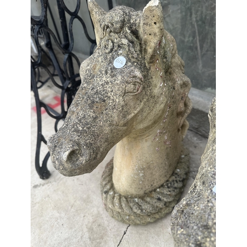 1514 - A PAIR OF CONCRETE HORSE HEAD GARDEN FIGURES