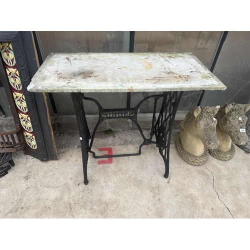 1515 - A CONSOLE TABLE FORMED WITH A SINGER TREADLE BASE AND A MARBLE TOP