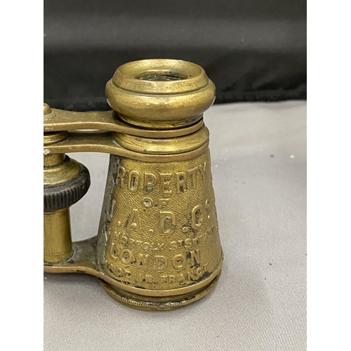 18 - A PAIR OF BRASS OPERA GLASSES, 19TH CENTURY AND INSCRIBED. THESE WERE MADE FOR HIRE IN THEATRES AND ... 