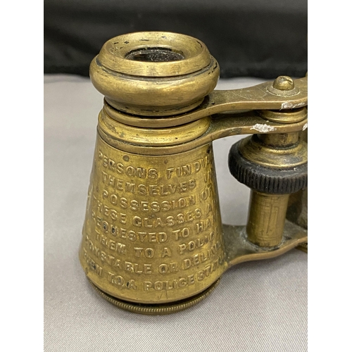 18 - A PAIR OF BRASS OPERA GLASSES, 19TH CENTURY AND INSCRIBED. THESE WERE MADE FOR HIRE IN THEATRES AND ... 