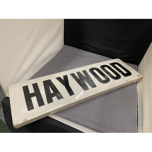 23 - A VINTAGE CERAMIC AND GLAZED SIGN HAYWOOD 48.5CM X 15CM