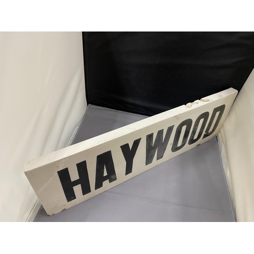 23 - A VINTAGE CERAMIC AND GLAZED SIGN HAYWOOD 48.5CM X 15CM