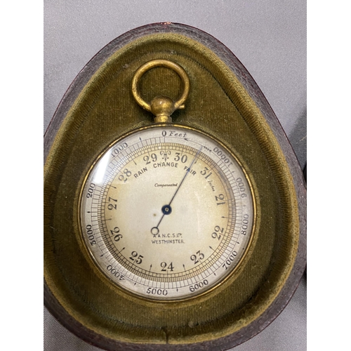 29 - A VINTAGE POCKET CASED SET CONTAINING A BAROMETER, COMPASS AND THERMOMETER MARKED A & N.C.S.LTD WEST... 