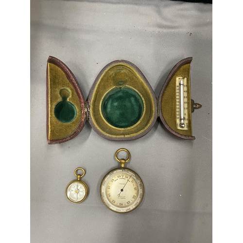 29 - A VINTAGE POCKET CASED SET CONTAINING A BAROMETER, COMPASS AND THERMOMETER MARKED A & N.C.S.LTD WEST... 