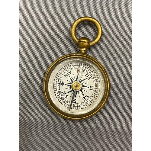 29 - A VINTAGE POCKET CASED SET CONTAINING A BAROMETER, COMPASS AND THERMOMETER MARKED A & N.C.S.LTD WEST... 