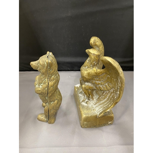 36 - TWO BRASS ITEMS TO INCLUDE A STANDING BEAR MONEY BOX AND AN EAGLE