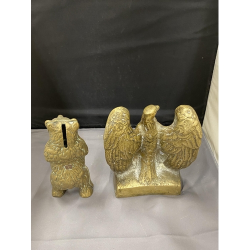 36 - TWO BRASS ITEMS TO INCLUDE A STANDING BEAR MONEY BOX AND AN EAGLE