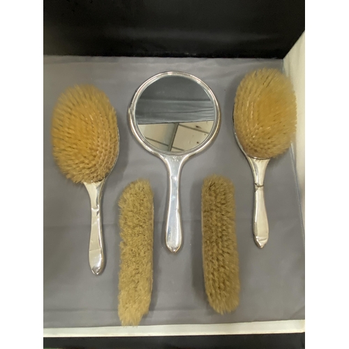 46A - FIVE ITEMS TO INCLUDE TWO HAIRBRUSHES, A MIRROR AND TWO CLOTHES BRUSHES ONE WITH INDISTINCT HALLMARK... 