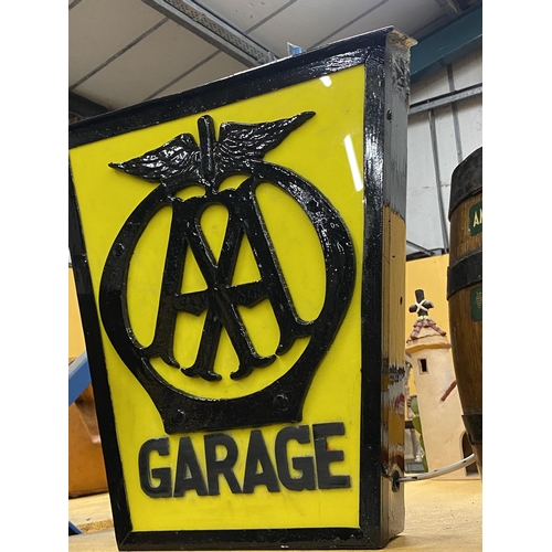 54 - AN AA GARAGE ILLUMINATED LIGHT BOX SIGN