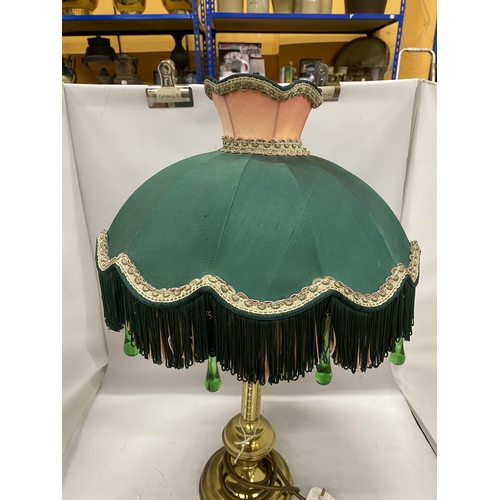 59 - A DECORATIVE BRASS LAMP BASE AND A VICTORIAN STYLE GREEN AND PINK FABRIC SHADE WITH FRINGE AND GREEN... 