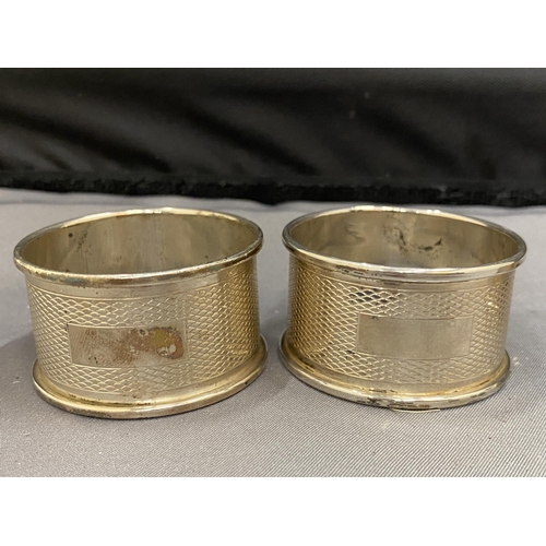 6A - SEVEN VARIOUS HALLMARKED SILVER NAPKIN RINGS TO INCLUDE TWO PAIRS OF BIRMINGHAM, A CHESTER, LONDON  ... 